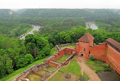 Latvia: Medieval Castle Ruins by a River